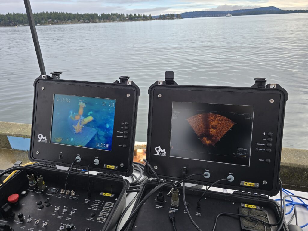 Controller screens with live imaging from the Chinook ROV camera and KONGSBERG Flexview